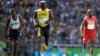Jamaica's Usain Bolt, center, Trinidad and Tobago's Richard Thompson, right, and Britain's James Dasaolu compete in a men's 100-meter heat during the athletics competitions of the 2016 Summer Olympics at the Olympic stadium in Rio de Janeiro, Brazil, Aug. 13, 2016