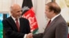 Pakistan's Prime Minister Nawaz Sharif, right, receives Afghan President Ashraf Ghani at the prime minister house in Islamabad, Pakistan, Saturday, Nov. 15, 2014.