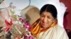 মুম্বাইতে এক অনুষ্ঠানে কিংবদন্তি সঙ্গীতশিল্পী লতা মঙ্গেশকর। (ফাইল ছবি- এপি) 