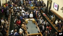 Members of the House of Assembly sit inside the Zimbabwean Parliament in Harare, Nov. 21 2017. 