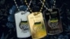 Souvenir dogtags celebrate the 100th anniversary of South Africa's ruling African National Congress (ANC) party. (File)