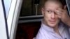 FILE - In this file image taken from video obtained from Voice Of Jihad Website, which has been authenticated based on its contents and other AP reporting, Sgt. Bowe Bergdahl, sits in a vehicle guarded by the Taliban in eastern Afghanistan.
