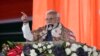 Perdana Menteri India Narendra Modi berpidato di Stadion Moulana Azad saat ia meresmikan beberapa proyek di Jammu dan Kashmir, di Jammu, India, 20 Februari 2024. (Foto: AP)