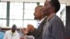Fusi Mofokeng and Tshokolo Mokoena speak to South African students shortly after their release from prison for a crime they say they did not commit, January 2013. (Wits Justice Project) 