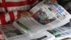 A newsstand, along a street in Siem Reap province, sells The Phnom Penh Post newspapers in both English and Khmer languages, Siem Reap, Cambodia, Thursday, May 10, 2018. (Sun Narin/VOA Khmer) 