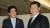习近平邀安倍观阅兵 秀肌肉警告日本