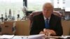 FILE - Republican presidential candidate Donald Trump is photographed during an interview in his office at Trump Tower in New York, May 10, 2016.